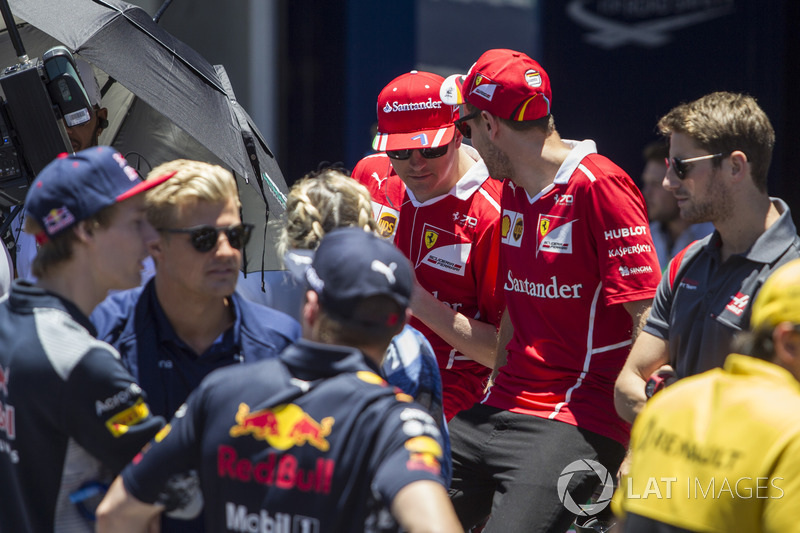 Kimi Raikkonen, Ferrari and Sebastian Vettel, Ferrari on the drivers parade