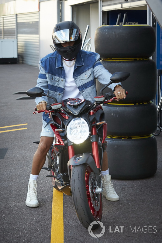 Lewis Hamilton, Mercedes AMG F1, on his motorbike