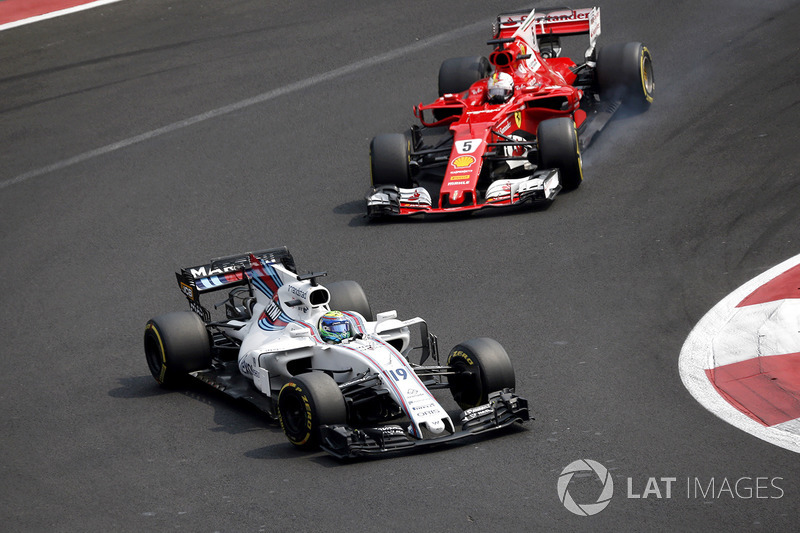 Felipe Massa, Williams FW40 and Sebastian Vettel, Ferrari SF70H battle