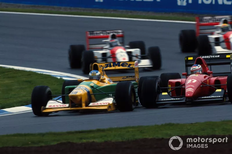 Michael Schumacher, Benetton B192 and Jean Alesi, Ferrari F92A