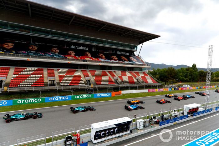 Esteban Ocon, Alpine A521, leads Charles Leclerc, Ferrari SF21, Daniel Ricciardo, McLaren MCL35M, Sergio Perez, Red Bull Racing RB16B, Lando Norris, McLaren MCL35M, Fernando Alonso, Alpine A521, Lance Stroll, Aston Martin AMR21, and Sebastian Vettel, Aston Martin AMR21, at the start