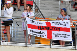 Lewis Hamilton, Mercedes AMG F1 fans and banner