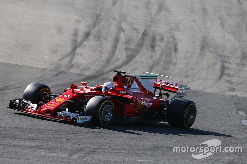 Sebastian Vettel, Ferrari SF70H, leads Max Verstappen, Red Bull Racing RB13, and Lewis Hamilton, Mercedes AMG F1 W08