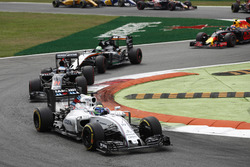 Felipe Massa, Williams FW38 Mercedes y Fernando Alonso, McLaren MP4-31 Honda, con Nico Hulkenberg, F
