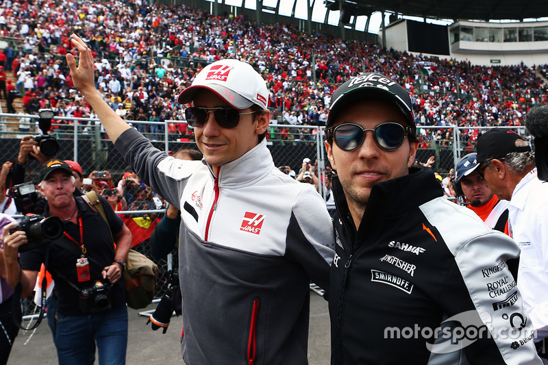 (L to R): Esteban Gutierrez, Haas F1 Team with Sergio Perez, Sahara Force India F1 on the drivers parade