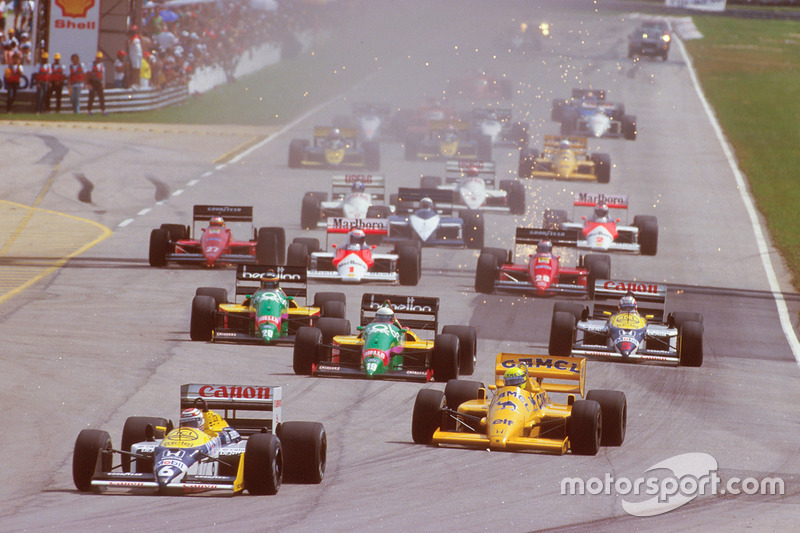 Nelson Piquet, Williams FW11B Honda, lidera a Ayrton Senna, Team Lotus Honda 99T, Teo Fabi, Benetton B187 Ford, Thierry Boutsen, Benetton B187 Ford y Nigel Mansell, Williams FW11B Honda, al inicio