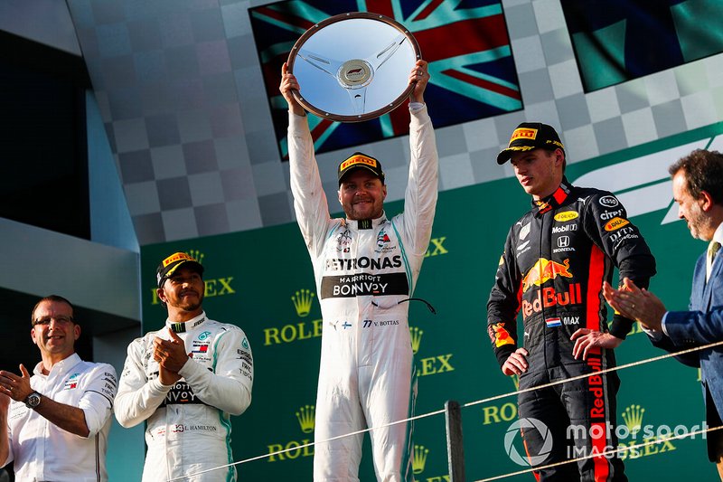 Valtteri Bottas, Mercedes AMG F1, 1st position, lifts his trophy on the podium