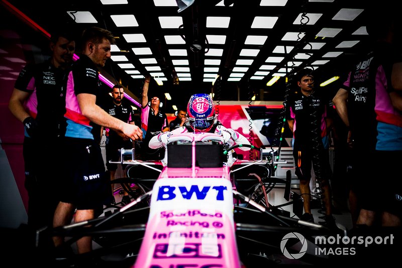 Lance Stroll, Racing Point, climbs into his car