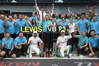 Lewis Hamilton, Mercedes AMG F1, Valtteri Bottas, Mercedes AMG F1, and colleagues, including Toto Wolff, Executive Director (Business), Mercedes AMG, celebrate victory
