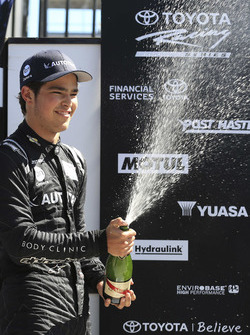 Podium: second place Pedro Piquet celebrates with champagne