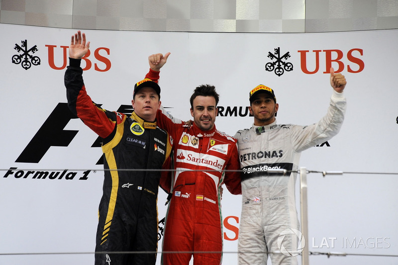 Podium: second place Kimi Raikkonen, Lotus F1 Team, Race winner Fernando Alonso, Ferrari, third plac