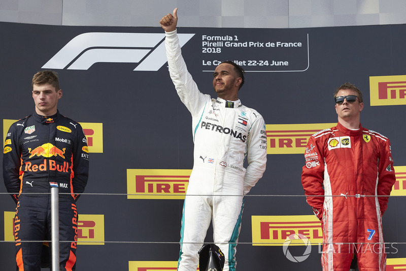 Max Verstappen, Red Bull Racing, 2nd position, Lewis Hamilton, Mercedes AMG F1, 1st position, and Kimi Raikkonen, Ferrari, 3rd position, on the podium