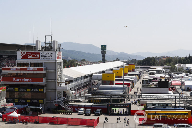 Team trucks behind the garages