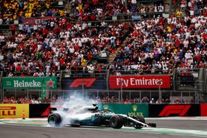 Lewis Hamilton, Mercedes AMG F1 W09 EQ Power+, performs a doughnut as he celebrates winning his fifth World Championship