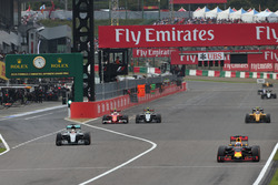 Daniel Ricciardo, Red Bull Racing RB12 leads Lewis Hamilton, Mercedes AMG F1 W07 Hybrid, Kimi Raikko