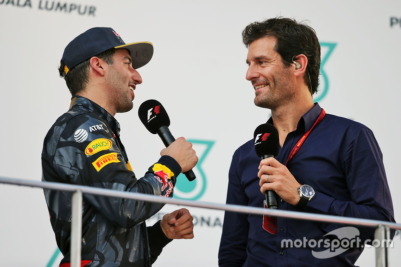 (L to R): Race winner Daniel Ricciardo, Red Bull Racing on the podium with Mark Webber, Porsche Team WEC Driver / Channel 4 Presenter