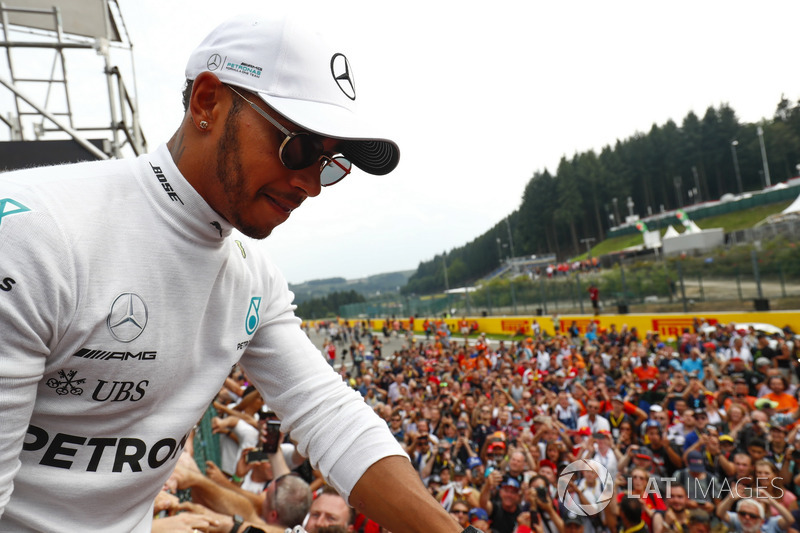 Race winner Lewis Hamilton, Mercedes AMG F1, celebrates with fans after the race