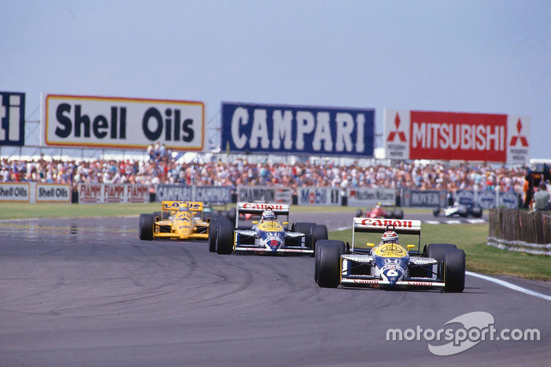 Nelson Piquet, Williams FW11B Honda, leads Nigel Mansell, Williams FW11B Honda and Ayrton Senna, Team Lotus Honda 99T