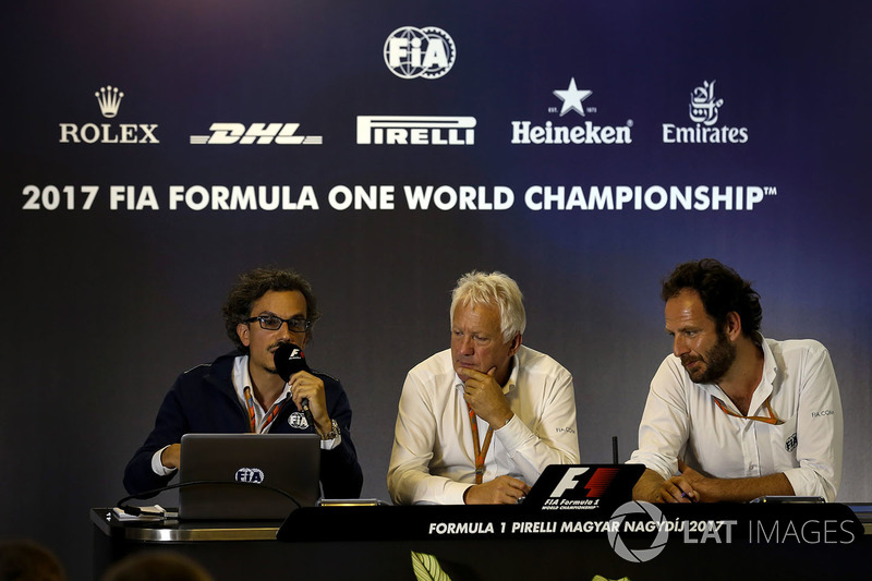 Laurent Mekies, FIA Safety Director, Charlie Whiting, FIA Delegate and Matteo Bonciani, FIA Media De