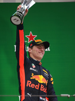 Max Verstappen, Red Bull Racing,celebrates with his trophy on the podium