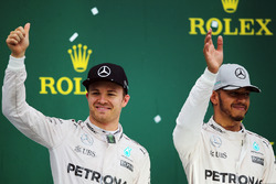 The podium (L to R): second placed Nico Rosberg, Mercedes AMG F1 with team mate and race winner Lewis Hamilton, Mercedes AMG F1