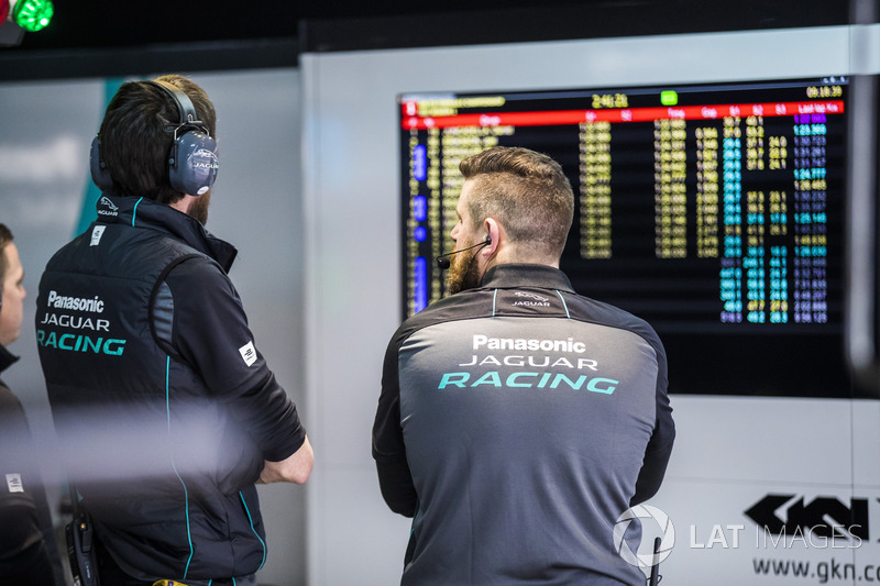 Jaguar mechanics watching the timing screens
