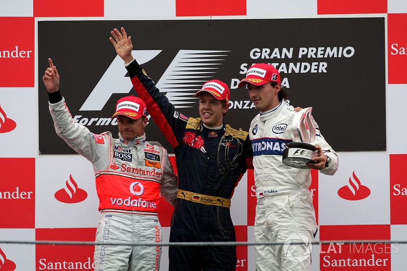 Podium: race winner Sebastian Vettel, Scuderia Toro Rosso, second place Heikki Kovalainen, McLaren, 