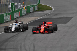 Sebastian Vettel, Ferrari SF71H and Marcus Ericsson, Sauber C37