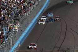 Matt Kenseth, Joe Gibbs Racing Toyota, takes the checkered flag