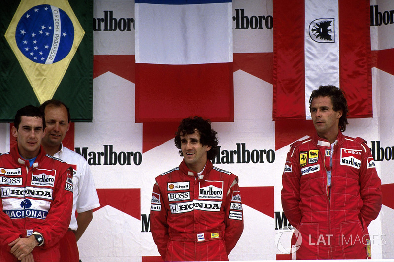 Podium: race winner Alain Prost, McLaren, second place Ayrton Senna, McLaren, third place Gerhard Berger, Ferrari