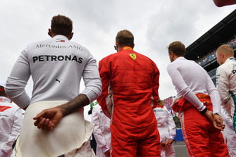 Lewis Hamilton, Mercedes AMG F1, Kimi Raikkonen, Ferrari and Sebastian Vettel, Ferrari on the grid