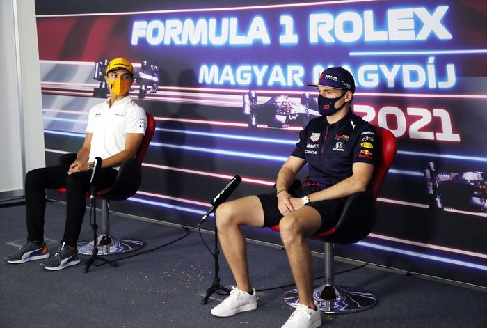 Lando Norris, McLaren. Max Verstappen, Red Bull Racing