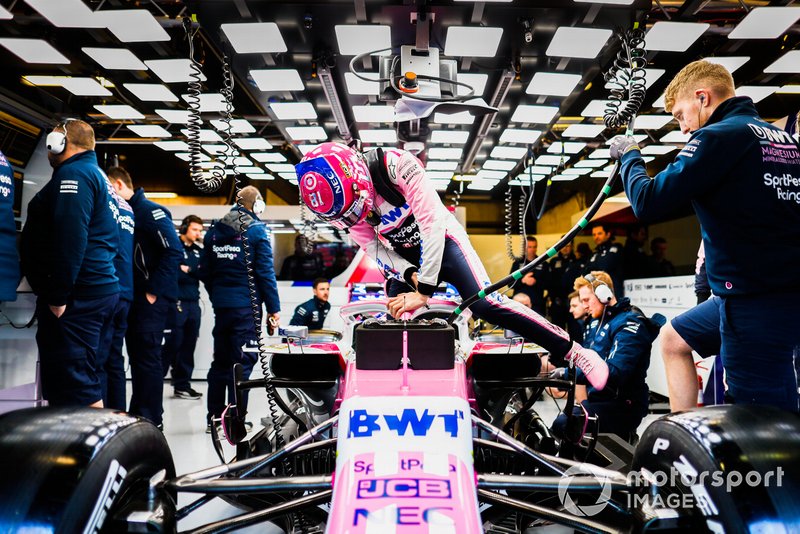 Lance Stroll, Racing Point RP19, getting into the car in the garage