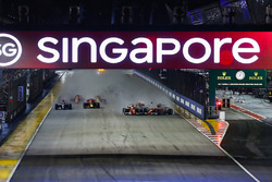 Sebastian Vettel, Ferrari SF70H, Max Verstappen, Red Bull Racing RB13, Kimi Raikkonen, Ferrari SF70H, collide at the start
