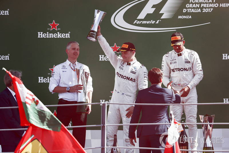 Second place Valtteri Bottas, Mercedes AMG F1, Race winner Lewis Hamilton, Mercedes AMG F1, receive their trophies
