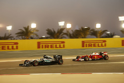 Lewis Hamilton, Mercedes AMG F1 Team W07 and Kimi Raikkonen, Ferrari SF16-H