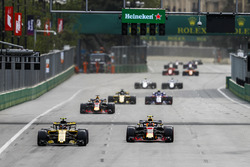 Carlos Sainz Jr., Renault Sport F1 Team R.S. 18, leads Max Verstappen, Red Bull Racing RB14 Tag Heuer, Daniel Ricciardo, Red Bull Racing RB14 Tag Heuer, and Nico Hulkenberg, Renault Sport F1 Team R.S. 18