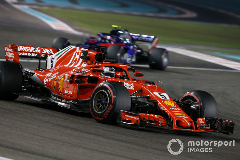 Sebastian Vettel, Ferrari SF71H and Pierre Gasly, Scuderia Toro Rosso STR13