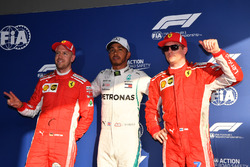Third place Sebastian Vettel, Ferrari, pole sitter Lewis Hamilton, Mercedes-AMG F1 and second place Kimi Raikkonen, Ferrari in parc ferme