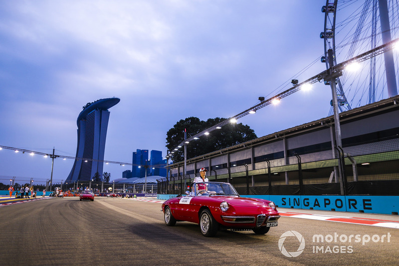 Charles Leclerc, Alfa Romeo Sauber F1 Team, on an Alfa Romeo Spyder, on the drivers' parade