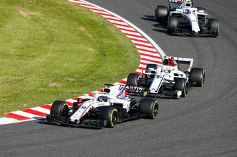 Lance Stroll, Williams FW41, Charles Leclerc, Sauber C37, and Sergey Sirotkin, Williams FW41