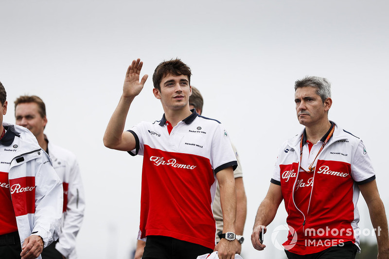 Charles Leclerc, Sauber, waves to the fans