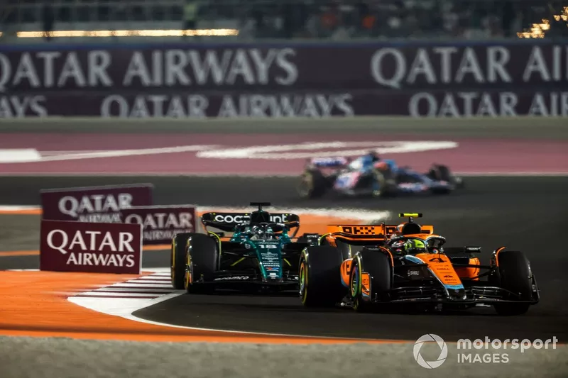 Lando Norris, McLaren MCL60, Lance Stroll, Aston Martin AMR23