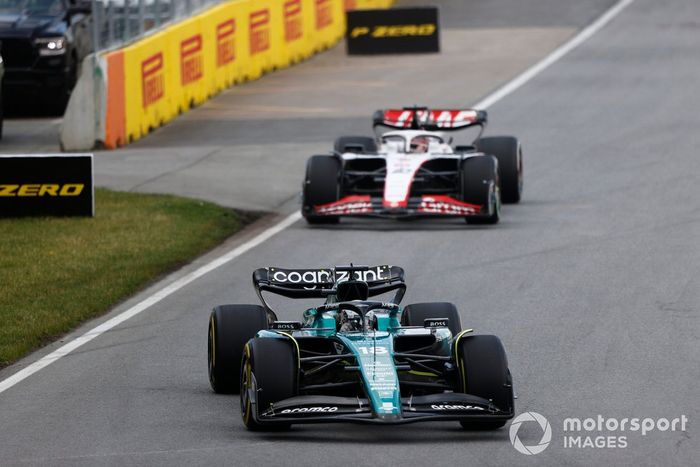 Lance Stroll, Aston Martin AMR23, Kevin Magnussen, Haas VF-23
