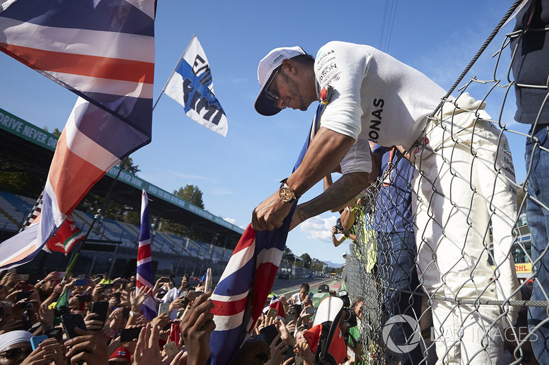 Lewis Hamilton, Mercedes AMG F1, signs autographs for fans