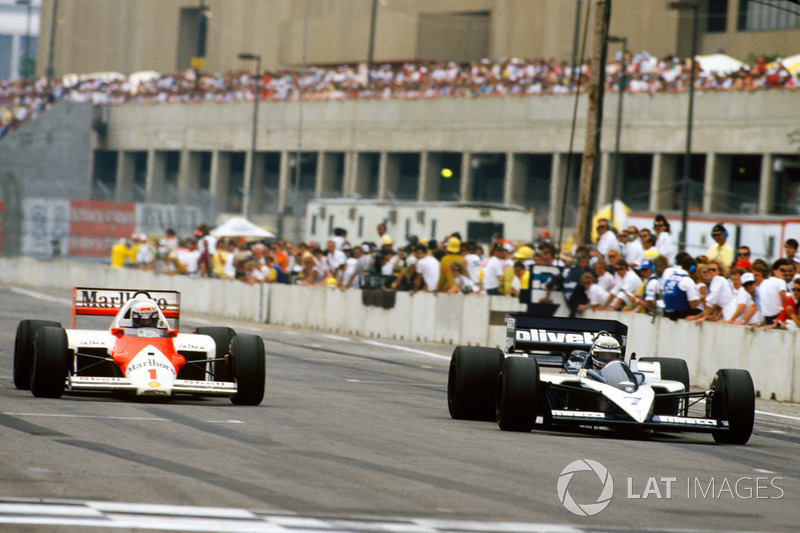 Alain Prost, McLaren MP4/2C-TAG Porsche, passes Riccardo Patrese, Brabham BT55-BMW