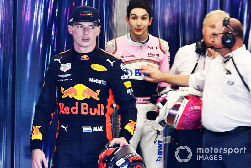 Max Verstappen, Red Bull Racing and Esteban Ocon, Racing Point Force India square up after the race following their on track crash 