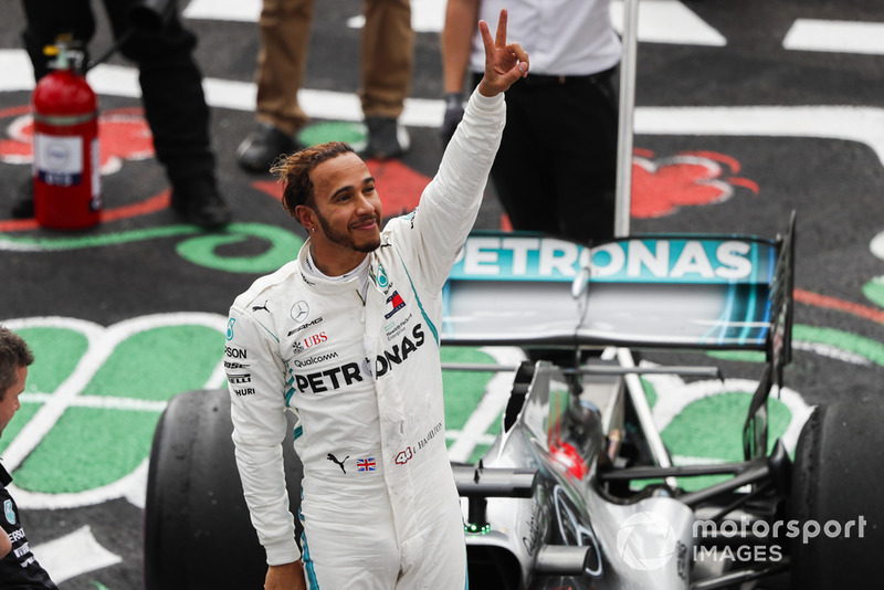 Lewis Hamilton, Mercedes AMG F1, celebrates after securing his 5th world drivers title