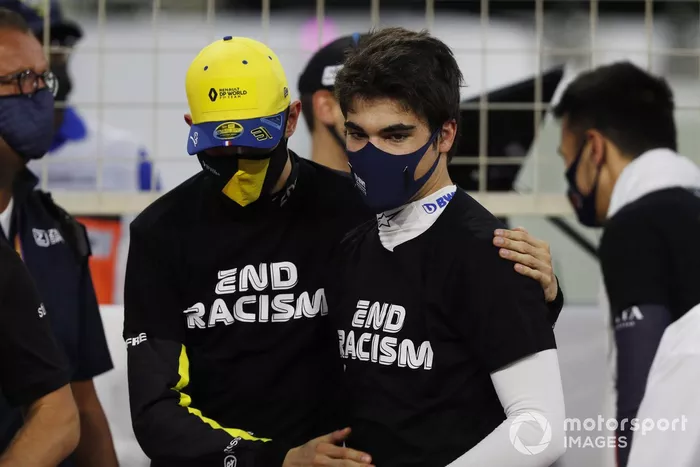 Esteban Ocon, Renault F1, e Lance Stroll, Racing Point, sulla griglia