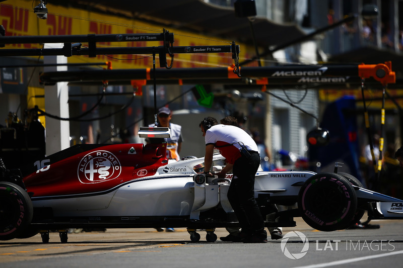 Charles Leclerc, Sauber C37, is returned to the garage